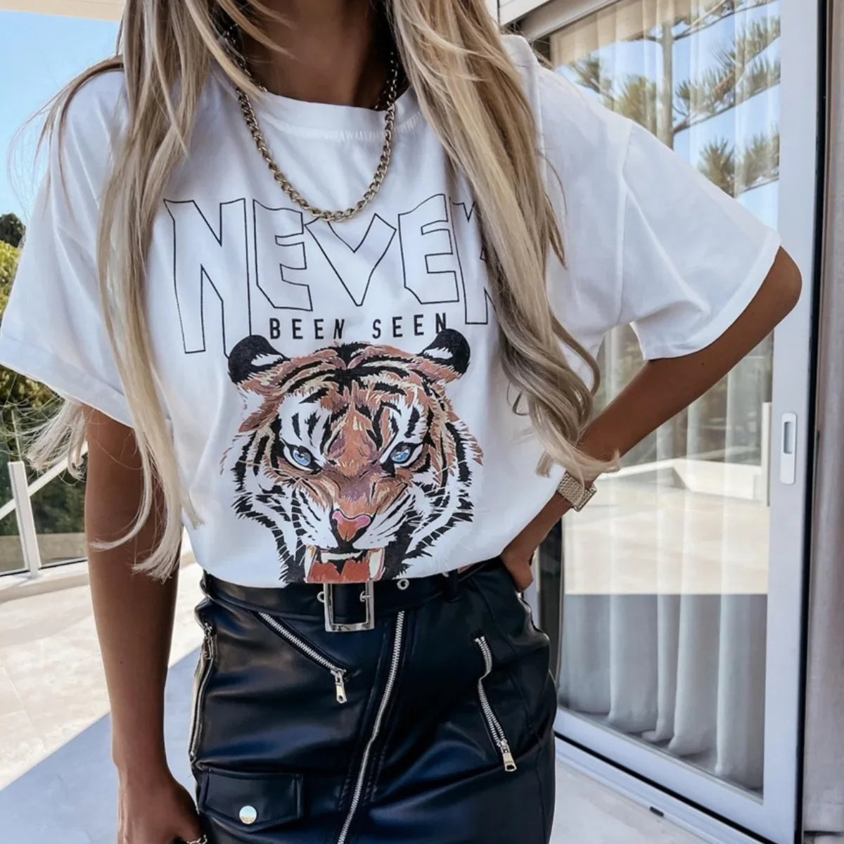 Indira - Lässiges Langarm-Sweatshirt mit Geparden-Tiger-Druck