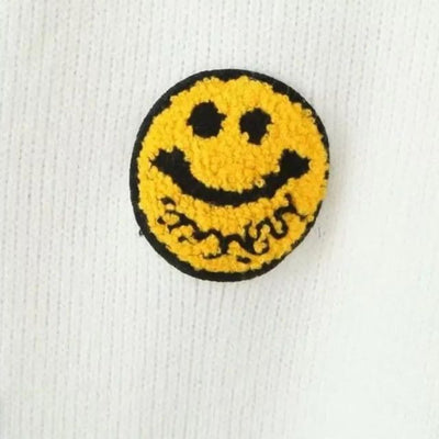 Yanna - Patchwork-Pullover mit Smiley-Detail